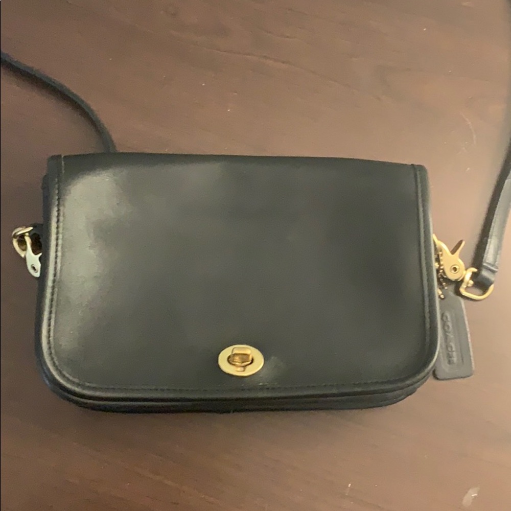 Navy blue vintage coach saddle bag